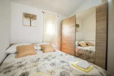 Krevet ili kreveti u jedinici u objektu Apartments Essentia