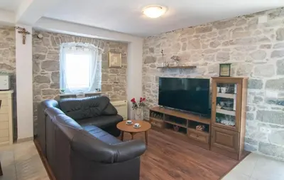 TV i/ili zabavni centar u objektu Holiday Home Tina
