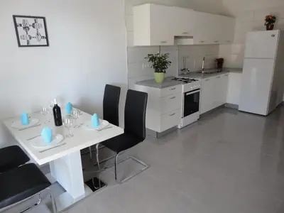 Kuhinja ili čajna kuhinja u objektu Paradise Apartments - Robinson getaway
