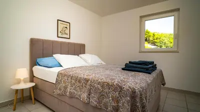 Krevet ili kreveti u jedinici u objektu Apartments Gandalj