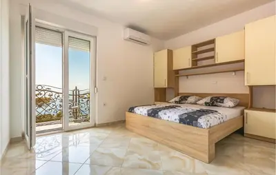 Krevet ili kreveti u jedinici u objektu One-Bedroom Apartment In Krvavica