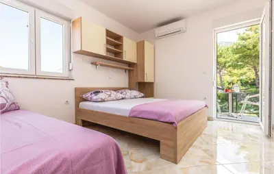 Krevet ili kreveti u jedinici u objektu One-Bedroom Apartment In Krvavica