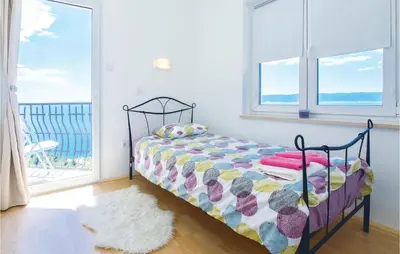 Krevet ili kreveti u jedinici u objektu Four-Bedroom Holiday Home In Pisak