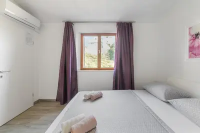 Krevet ili kreveti u jedinici u objektu Apartments and rooms by the sea Sumartin, Brac - 13285