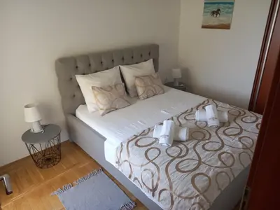 Krevet ili kreveti u jedinici u objektu Apartments Bogdan