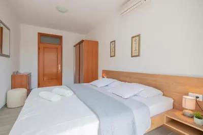 Krevet ili kreveti u jedinici u objektu Apartments Zvone