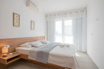 Krevet ili kreveti u jedinici u objektu Apartments Zvone