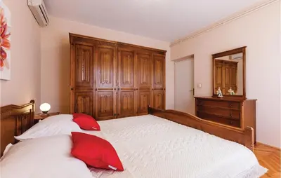 Krevet ili kreveti u jedinici u objektu Two-Bedroom Apartment In Duce