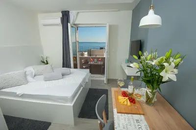 Krevet ili kreveti u jedinici u objektu Seaside Luxury Suites