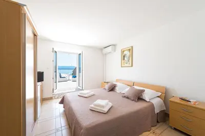Krevet ili kreveti u jedinici u objektu Riva Rooms