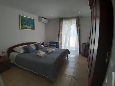 Krevet ili kreveti u jedinici u objektu Riva Rooms