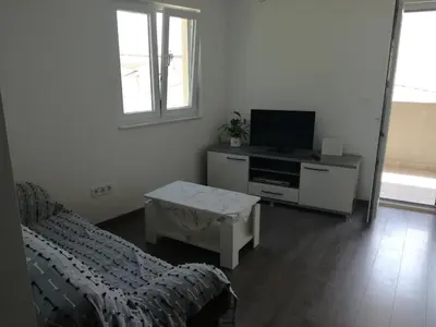 TV i/ili zabavni centar u objektu Apartments Suco