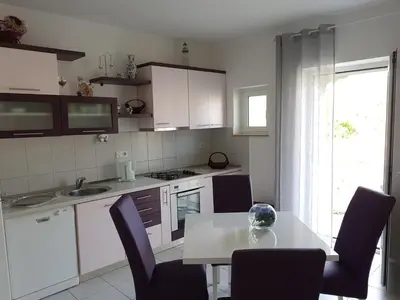 Kuhinja ili čajna kuhinja u objektu Apartments Sven
