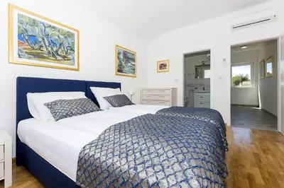 Krevet ili kreveti u jedinici u objektu Villa Makarac - Heated Pool, Beach 140m & Kids Playground I Brač