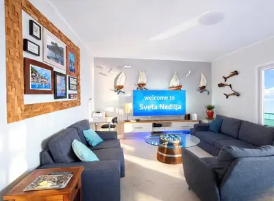 TV i/ili zabavni centar u objektu Apartments Vila Vino
