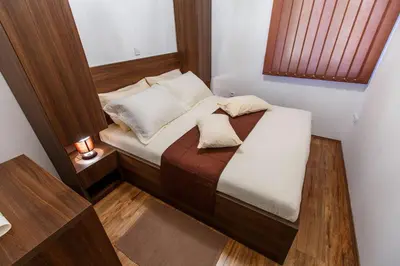 Krevet ili kreveti u jedinici u objektu Apartments by the sea Medici, Omis - 13634