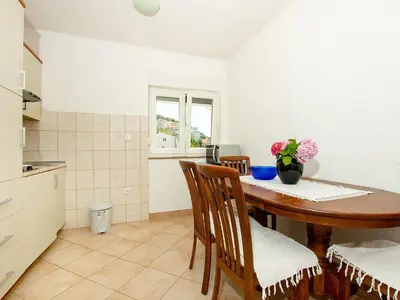 Kuhinja ili čajna kuhinja u objektu Cozy Seaside Apartment Celina