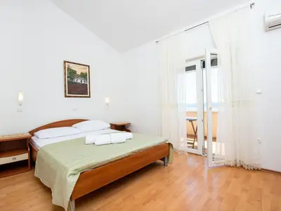 Krevet ili kreveti u jedinici u objektu Cozy Seaside Apartment Celina