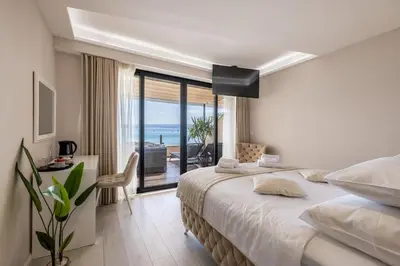 Krevet ili kreveti u jedinici u objektu Sea View Luxury Rooms Seven of Nine