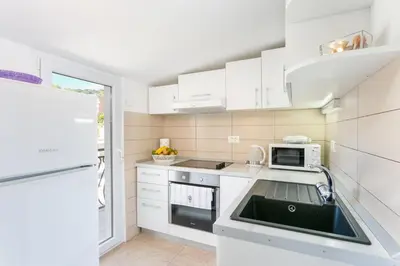 Kuhinja ili čajna kuhinja u objektu Family friendly seaside apartments Podstrana, Split - 13725