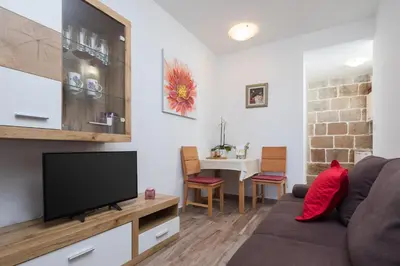 TV i/ili zabavni centar u objektu The Beach Suites