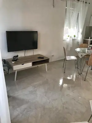 TV i/ili zabavni centar u objektu Sweet Corner