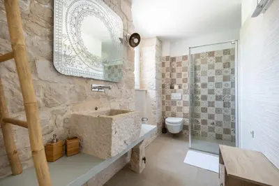 Kupaonica u objektu Villa Komelo