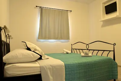Krevet ili kreveti u jedinici u objektu Apartments with parking space Podstrana, Split - 14112