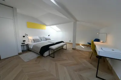 Krevet ili kreveti u jedinici u objektu Aparthotel Milenij