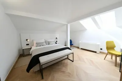 Krevet ili kreveti u jedinici u objektu Aparthotel Milenij