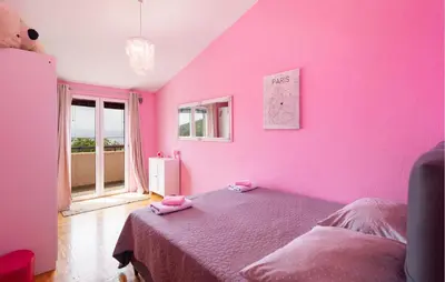 Krevet ili kreveti u jedinici u objektu Six-Bedroom Holiday Home In Podstrana