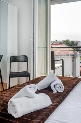 Krevet ili kreveti u jedinici u objektu Rooms&Apartments Zelux