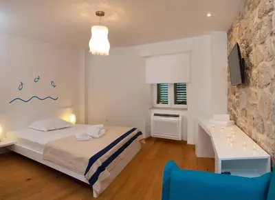 Krevet ili kreveti u jedinici u objektu Seaside family friendly house with a swimming pool Bol, Brac - 14239