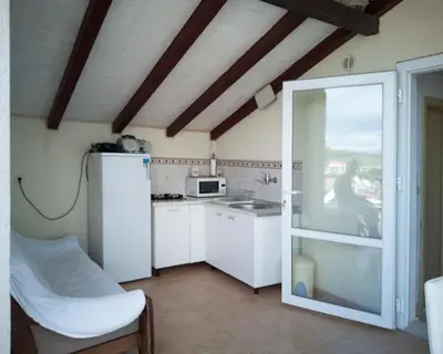 Kuhinja ili čajna kuhinja u objektu Villa Ujoli