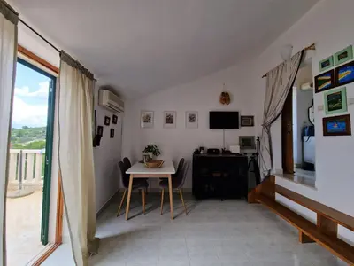 TV i/ili zabavni centar u objektu Home sweet home