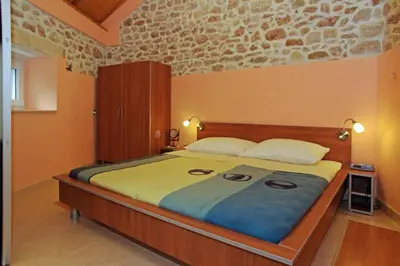 Krevet ili kreveti u jedinici u objektu Apartment Menego A2 BOL-CENTER, Croatia