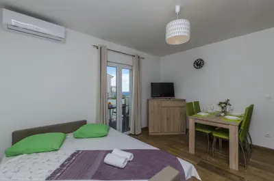 Krevet ili kreveti u jedinici u objektu Apartments Lorenzo