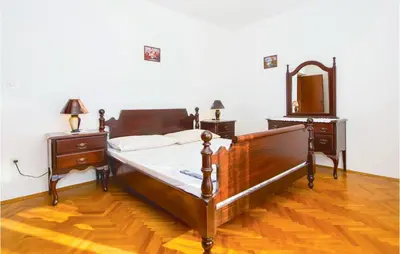 Krevet ili kreveti u jedinici u objektu Three-Bedroom Apartment In Podstrana