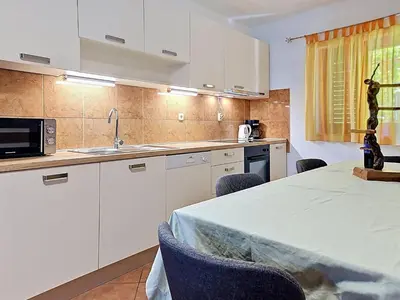 Kuhinja ili čajna kuhinja u objektu Holiday Home Gorana by Interhome