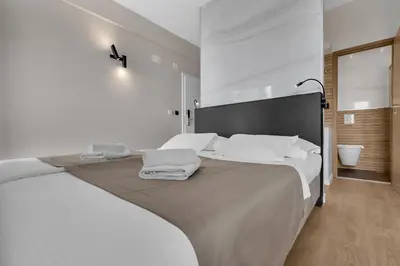 Krevet ili kreveti u jedinici u objektu Beach Hotel Božikovina