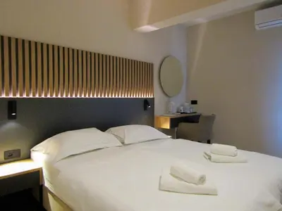 Krevet ili kreveti u jedinici u objektu Beach Hotel Božikovina