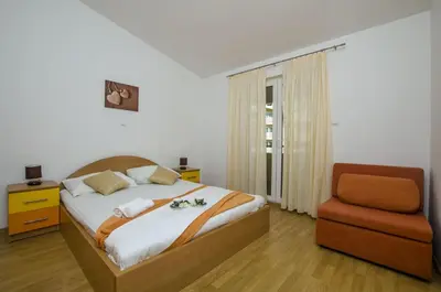 Krevet ili kreveti u jedinici u objektu Apartments Srecko