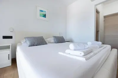 Krevet ili kreveti u jedinici u objektu Apartments and Rooms Bonkan Hvar