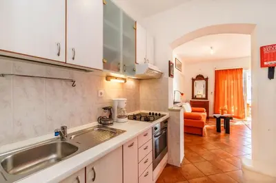 Kuhinja ili čajna kuhinja u objektu Beachfront Apartments Pisak 102