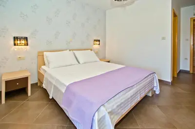 Krevet ili kreveti u jedinici u objektu Island Hvar Seaside Villa Levanda with Beach, Pool & Seaview