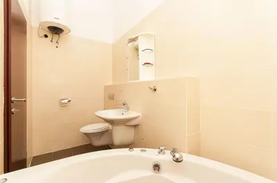 Kupaonica u objektu Modern new flat next to river Cetina