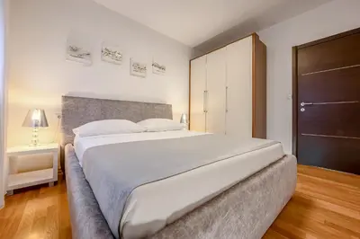 Krevet ili kreveti u jedinici u objektu VILLA ARYA - Heated pool, roof hot tub, gym, near the beach with amazing views!