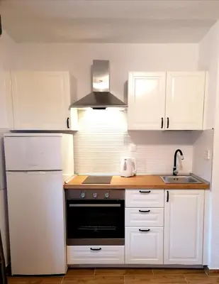 Kuhinja ili čajna kuhinja u objektu Apartments Amfora