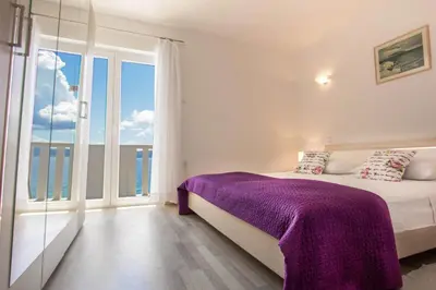 Krevet ili kreveti u jedinici u objektu Apartments Perla