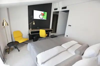 Krevet ili kreveti u jedinici u objektu Hotel Milenij